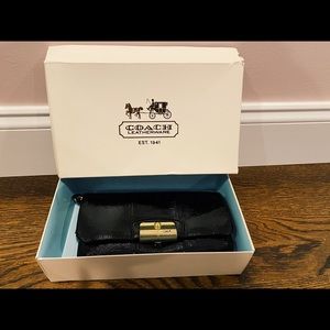 Coach medium sized patent leather wristlet